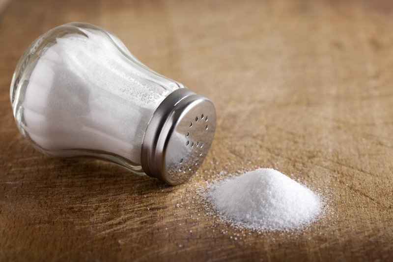 salt in wooden small plate